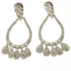 Cute dangling pierced earring.